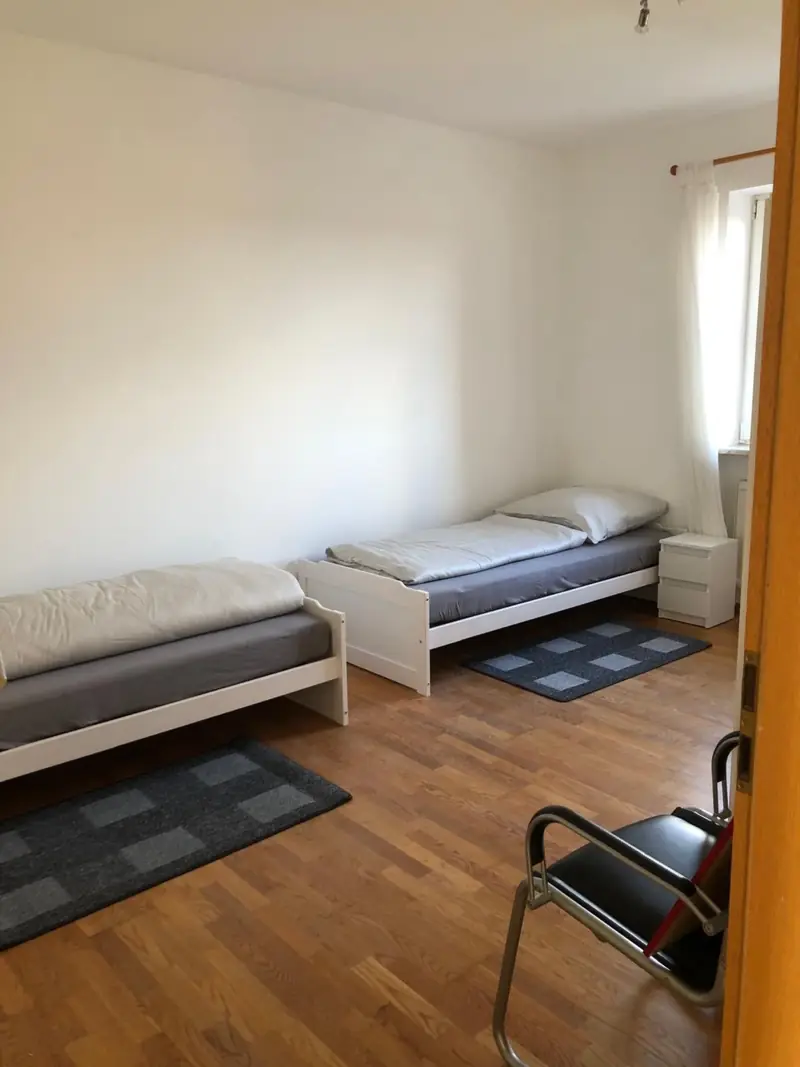 Zweibettzimmer mit Einzelbetten in Wohnung 1 der Casa Theresa